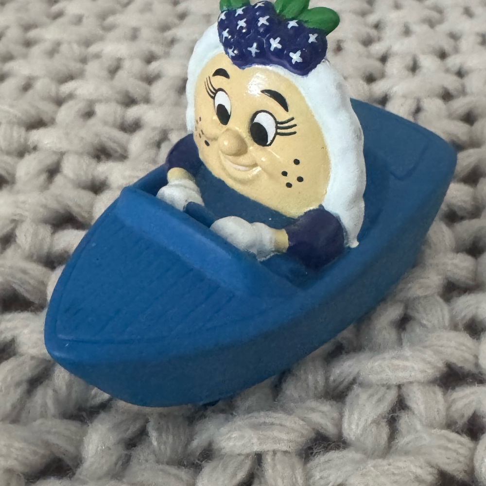 Charming Blue Toy Boat with Character